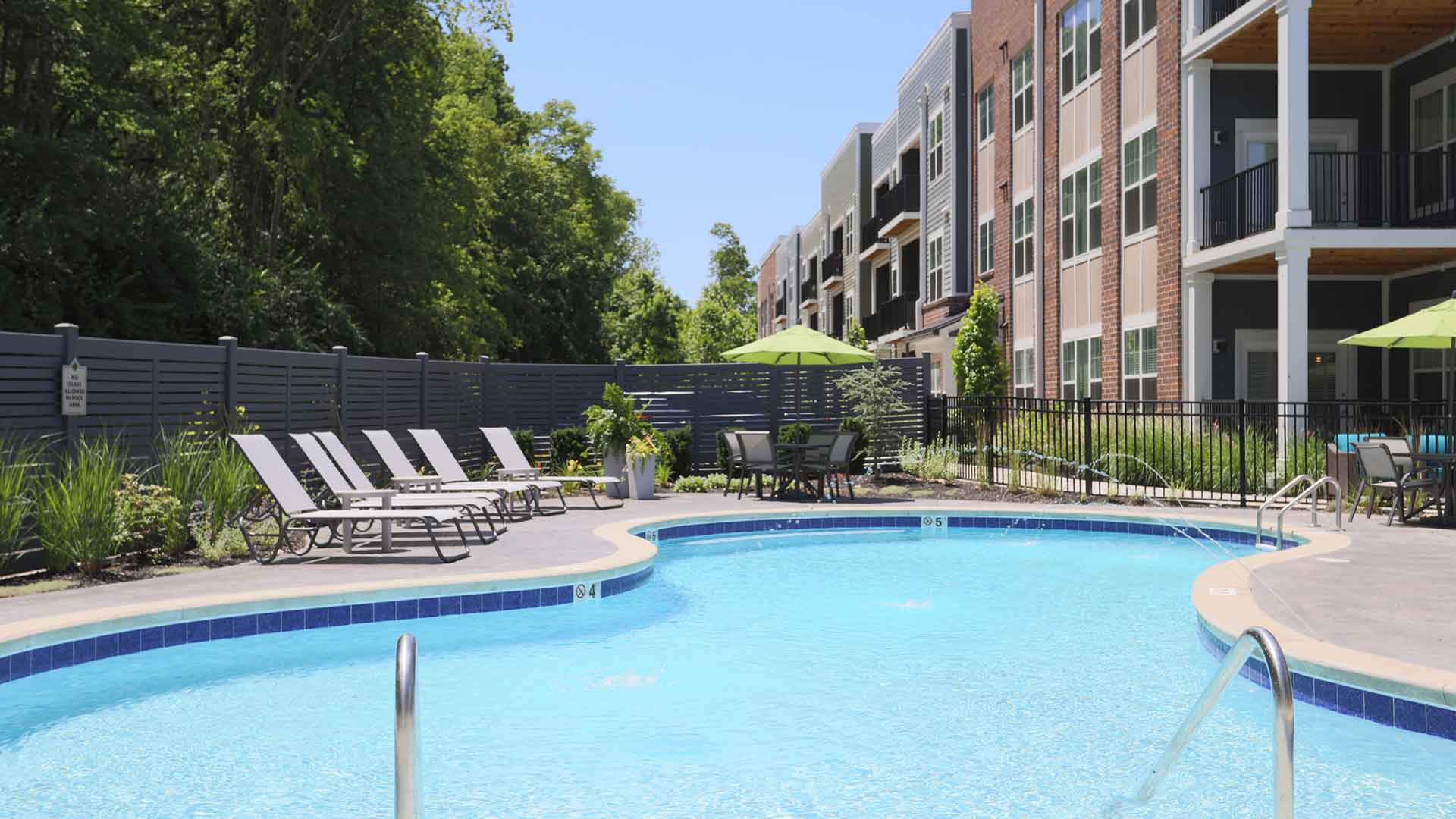 Outdoor pool and lounge area at Element Oakwood.
