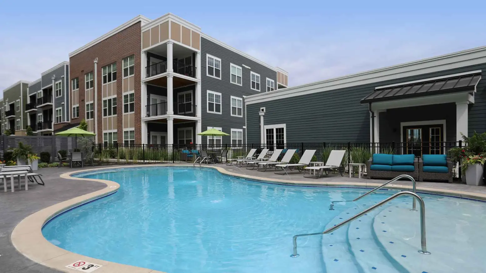 Apartment balconies overlooking the swimming pool at Element Oakwood.
