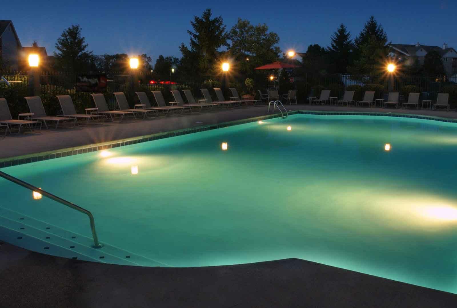 Pool lit at night.