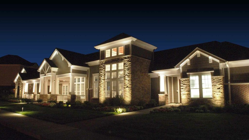 Exterior of Meridian on Shelbyville apartment office lit at night.