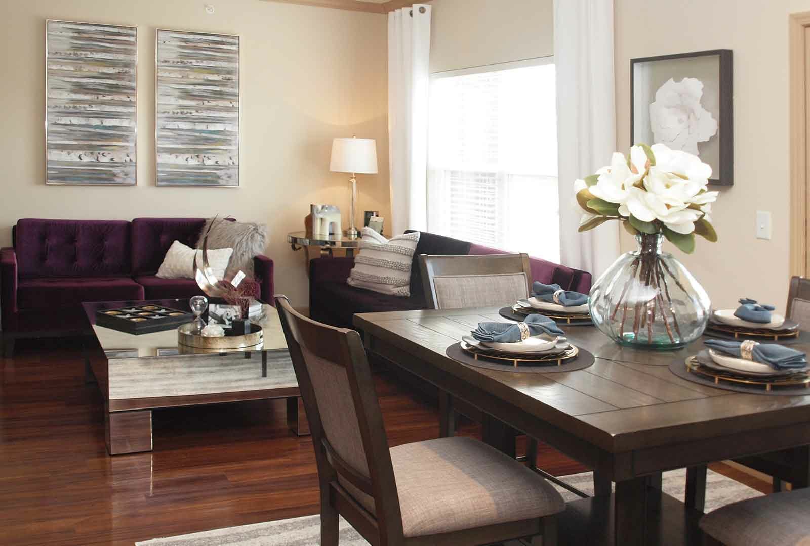 Fully decorated living and dining room space at Palmera.