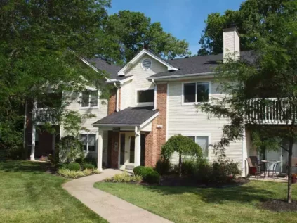 Apartment building with balconies and landscaping at Fox Chase North.