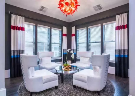 Community seating area with large lounge chairs.