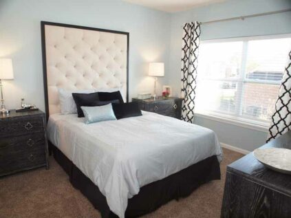 Spacious bedroom with natural lighting at Kendal on Taylorsville.