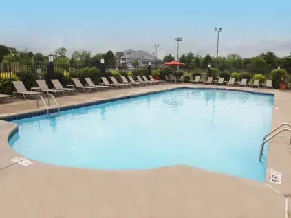 Pool with lounge chairs.