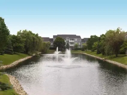 Small lake with fountains outside Sterling Lakes.