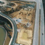 An aerial view of a HILLS property under development.