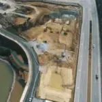 An aerial view of a HILLS property under development.