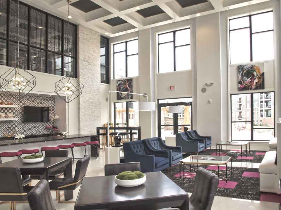 Extravagant clubhouse with geometric decor and furniture.