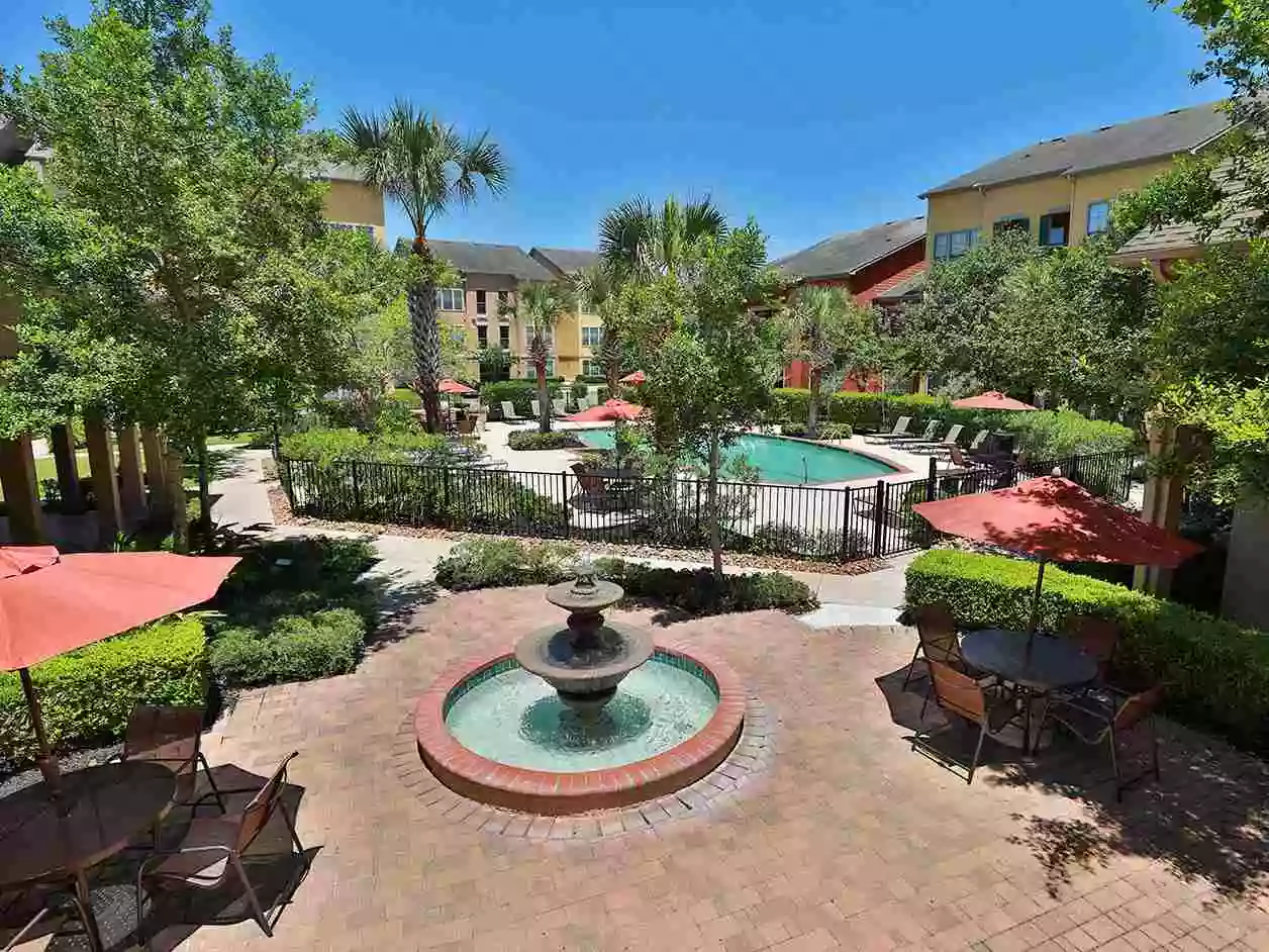 Backside of apartments, fountain and pool