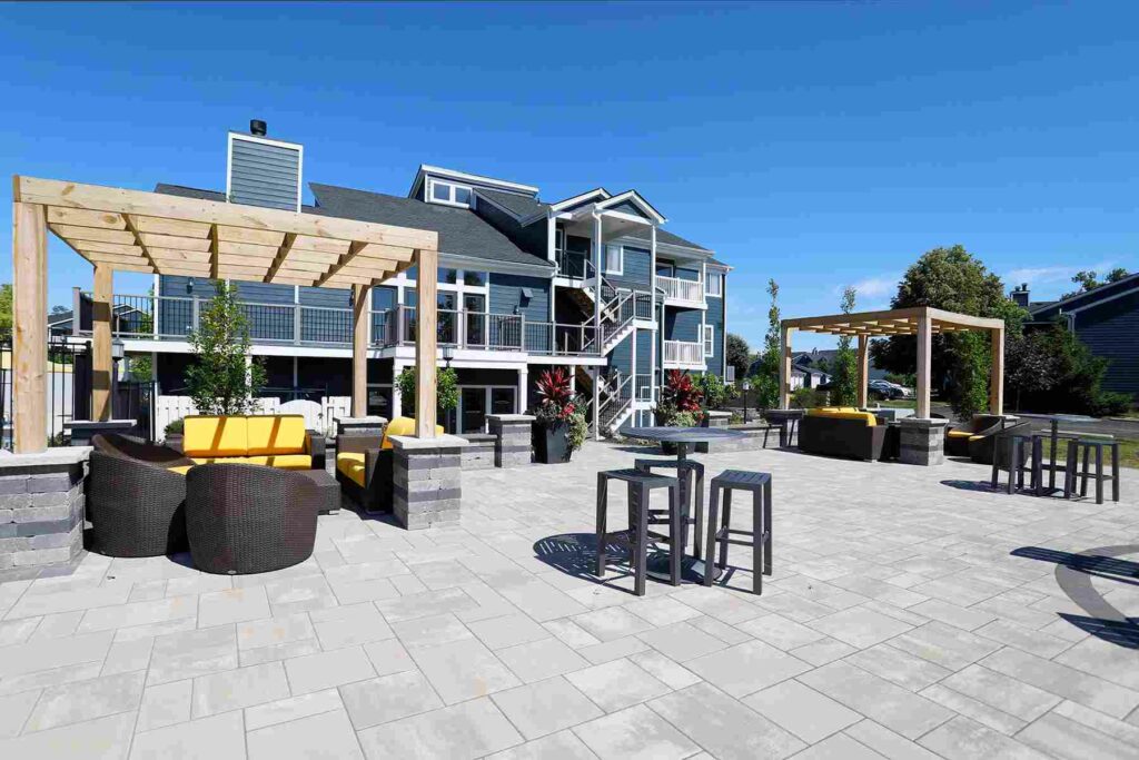 Clubhouse patio with gas fire pit and cabanas.