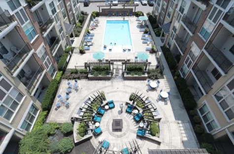 Aerial view of pool and social deck of 49Hundred Apartments