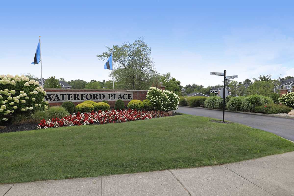 A large brick sign displaying the words, 