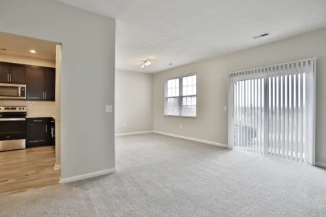 Front door view of of The Landings at Beckett Ridge floor plan. Kitchen area and living space.