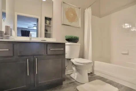 Bathroom at Emerald Lakes Apartments with full shower and bathtub