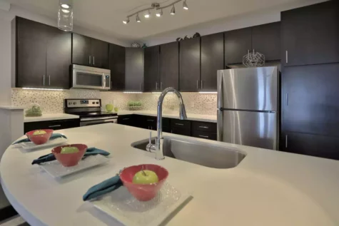 Kitchen with stainless steel appliances and island