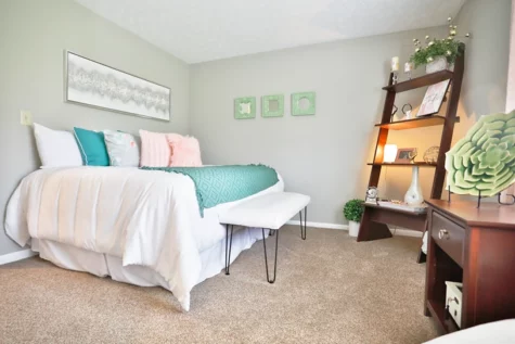 Fox Chase North Apartments bedroom with large bed, cabinets for decor