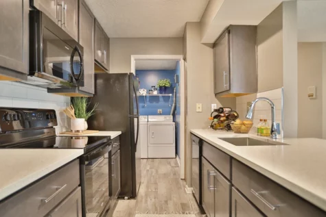 Fox Chase North Apartments kitchen 2, white countertops, grey cabinets, laundry toom