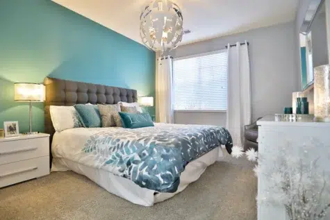 Shadow Ridge bedroom, large bed, dresser, side table