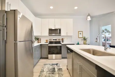 Another view of the kitchen, oven and microwave at Clocktower West Chester, Ohio Apartments