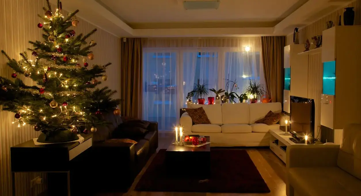 An apartment home filled with holiday decorations for Christmas.