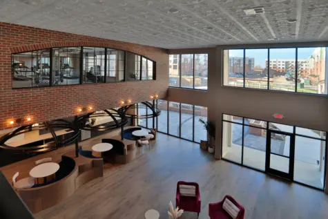 Clocktower West Chester Apartments top floor view of clubhouse area. Seated areas and gym.