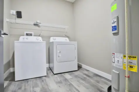 Utility room with washer and dryer Altair Apartments in Florence, KY