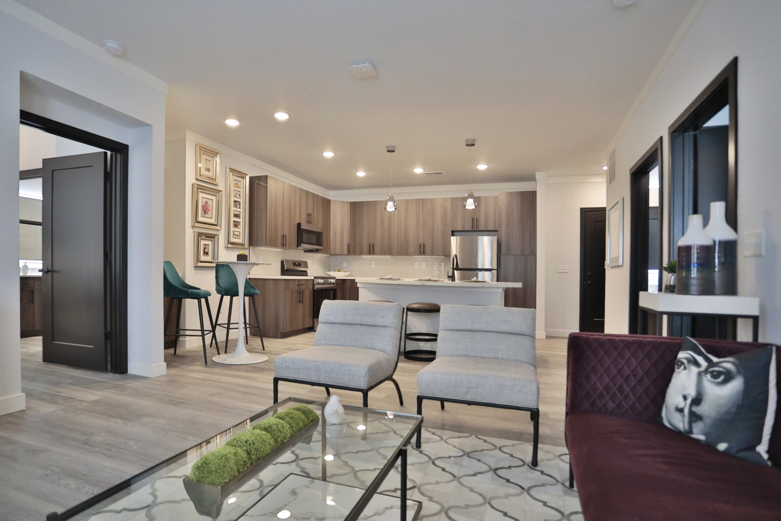 Living room space, kitchen view Vantage at Anderson Towne Center