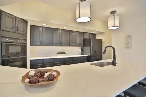 Wellington Place clubhouse, kitchen area in Fishers, IN. Plenty of counter space, sink, oven and refrigerator.