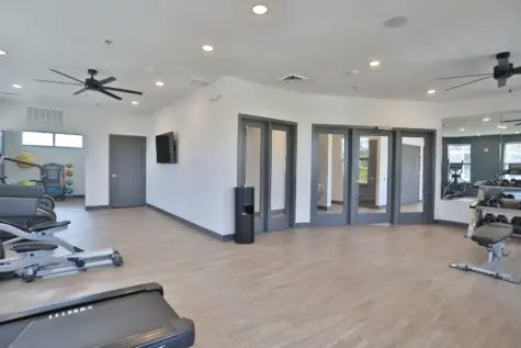 Altair in Florence Fitness Center featuring cardio and strength training equipment.