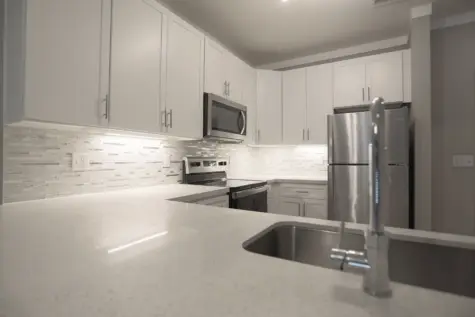 Element Oakwood 1-Bedroom Kitchen with Stainless Steel Appliances