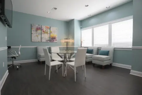 Reserve at Miller Farm resident business center with computer and printer.