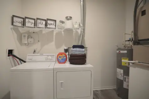 Reserve at Miller Farm laundry room with washer and dryer.