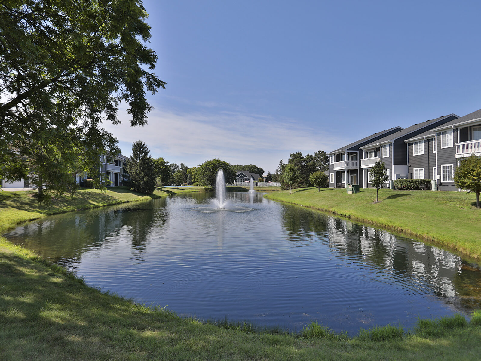 Wellington Place apartments near their water feature