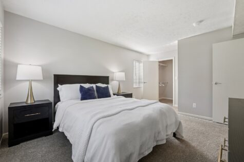 Primary bedroom with spacious closet and natural light at Fox Chase South Apartments in Southgate, KY.