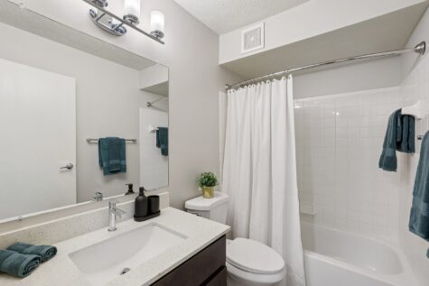 Renovated bathroom with spacious vanity and bright lighting in Southgate, Kentucky.
