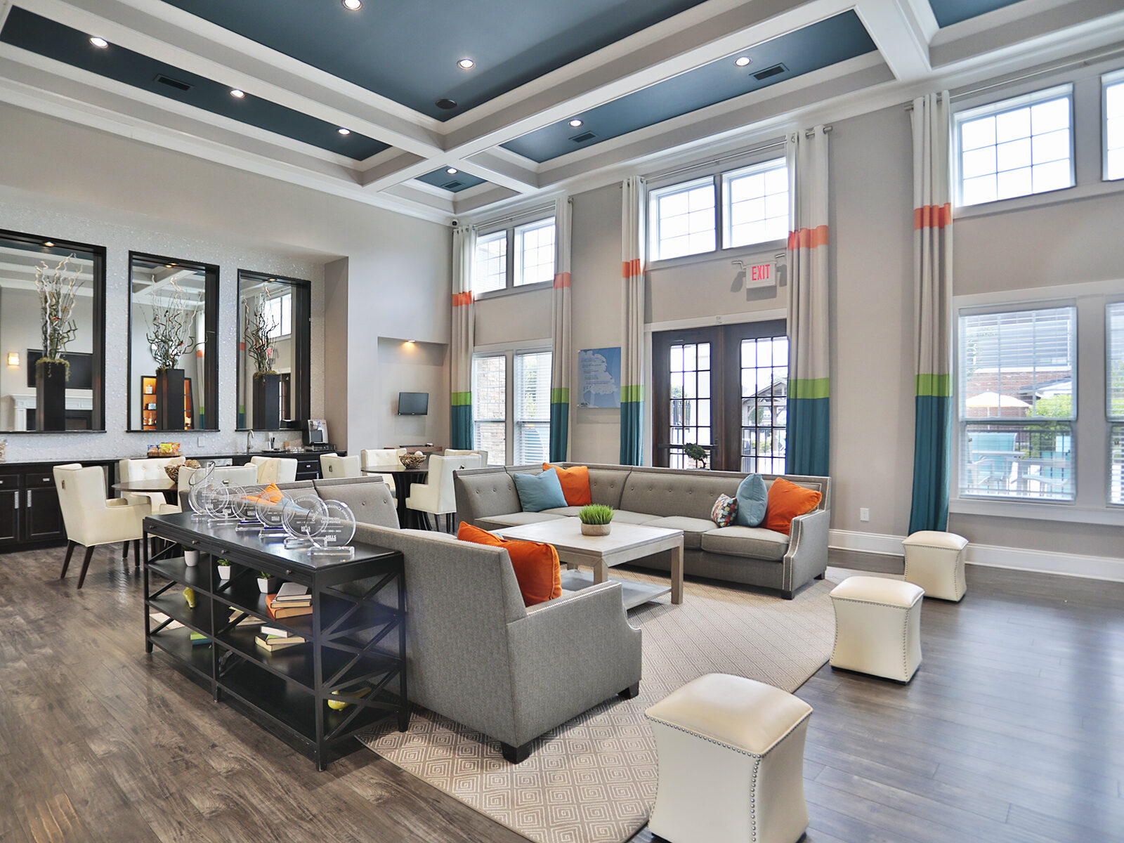 Clubhouse and leasing office at Kendal on Taylorsville featuring inviting lounge seating and a modern coffee bar, creating a warm and welcoming space for residents and guests.