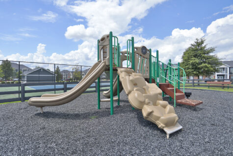 Playground at Kendal on Taylorsville providing a fun, family-friendly space with play structures and open areas for children to enjoy.