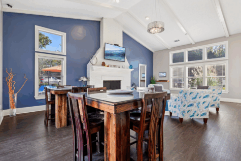 Social lounge with kitchen amenities at Fox Chase South near Cincinnati.