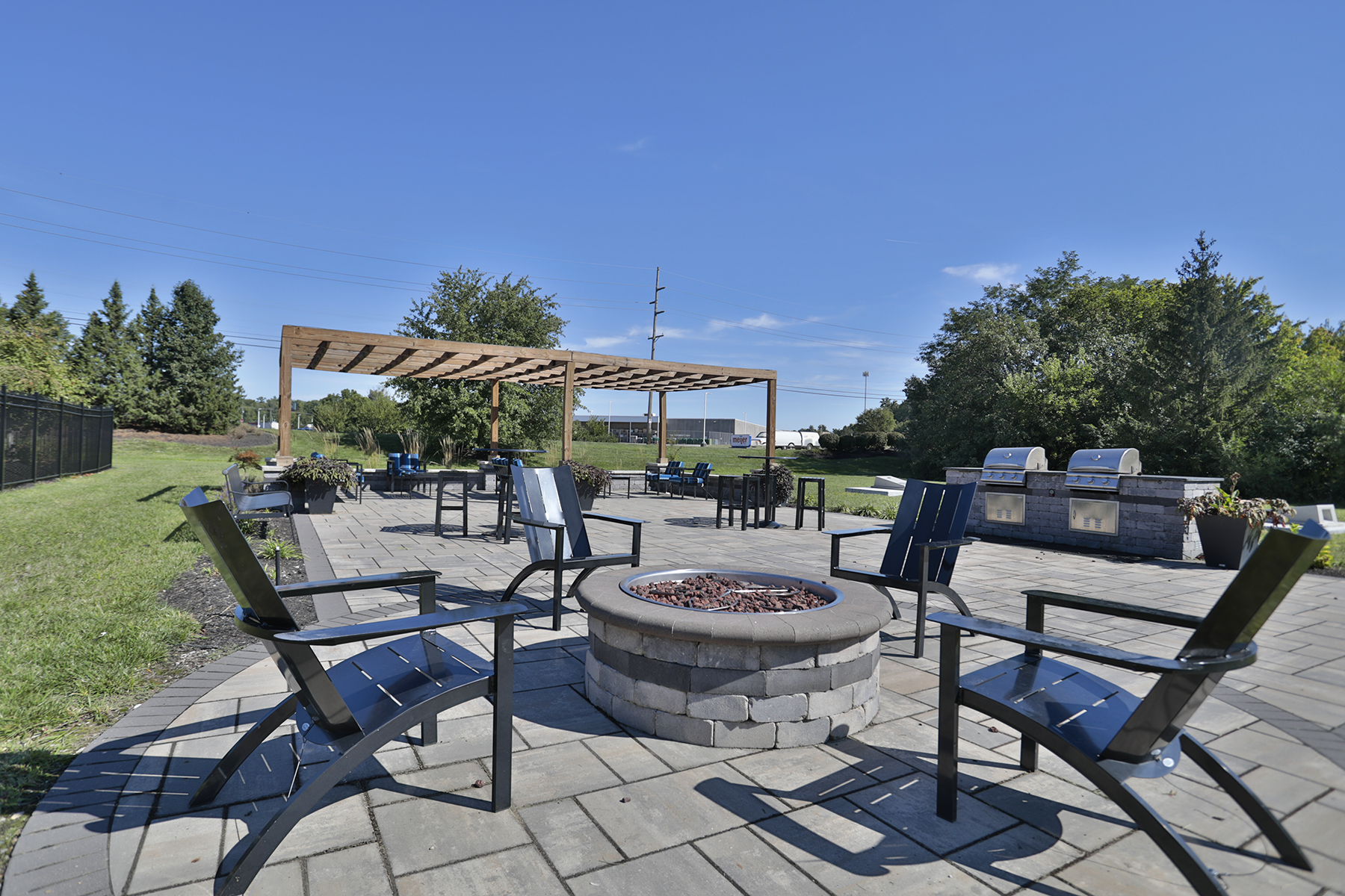 Waterford Place social deck showing fire pit and seating surrounding it.