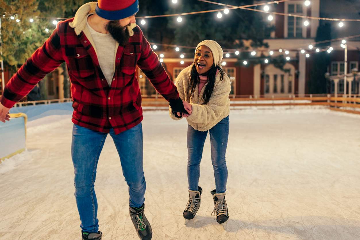 a couple ice skating