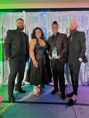 The HILLS Properties team celebrates together at the awards ceremony.